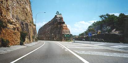 Australian way to build a highway (just cut through the mountains)
